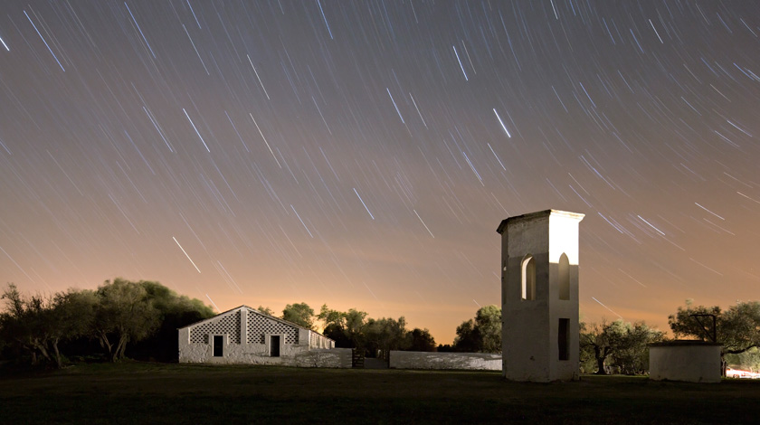horse stables by night